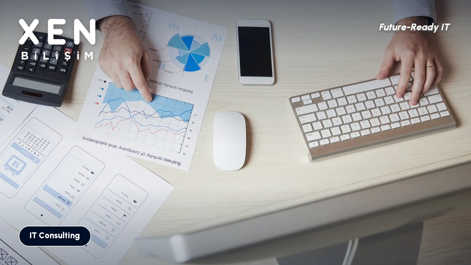 Hands over printed charts, a calculator and a keyboard, IT budget and end-of-support calendar — Xen Bilişim