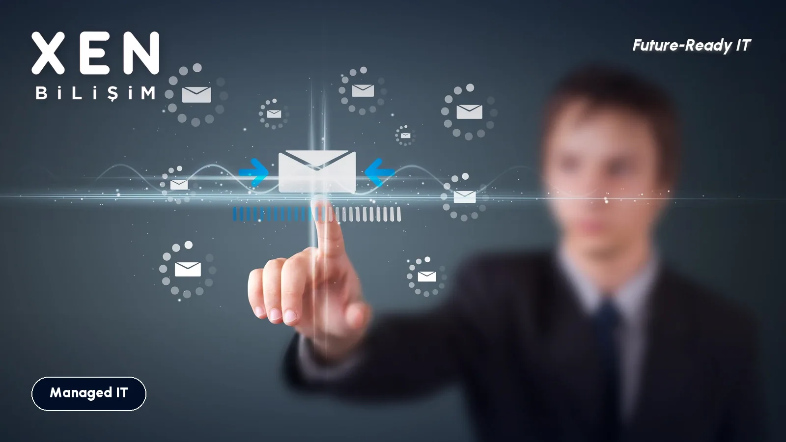 A hand reaching for an email icon on a touch screen — Xen Bilişim